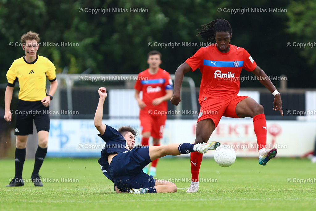 NH_HolsteinKielU23_FCEintrachtNorderstedt_Testspiel_05072025 | #25 Aurel Wagbe (Holstein Kiel U23), #30 Yevgeniy Obushnyi (FC Eintracht Norderstedt)Fußball I Herren I Testspiel I Saison 2025-2026  I Holstein Kiel U23 - FC Eintracht Norderstedt I 05.07.2025 I Stadtwerke Arena Eckernförde - Realisiert mit Pictrs.com