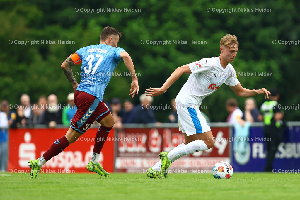 NH_SCWeicheFlensburg08_HolsteinKiel_Testspiel_28062025 | #37 Dominic Hartmann (SC Weiche Flensburg 08), #15 Kasper Davidsen (Holstein Kiel)Fußball I Herren I Freundschaftsspiel I Saison 2025-2026  I SC Weiche Flensburg 08 - Holstein Kiel I 28.06.2025 I Manfred-Werner-Stadion - Realisiert mit Pictrs.com