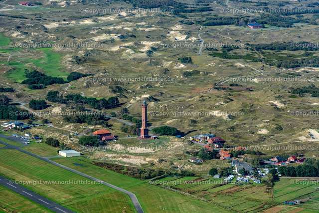 Norderney_Leuchtturm_ELS_5493091022 | NORDERNEY 09.10.2022 Leuchtturm in der Dünenlandschaft der Insel Norderney im Bundesland Niedersachsen. // Illuminated tower in the dunes of the island of Norderney in Lower Saxony. Foto: Martin Elsen