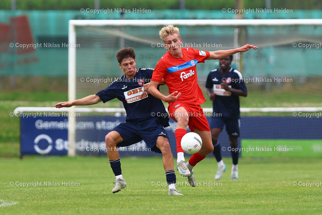 NH_HolsteinKielU23_FCEintrachtNorderstedt_Testspiel_05072025 | #4 Caspar Julius Medlin (Holstein Kiel U23), #30 Yevgeniy Obushnyi (FC Eintracht Norderstedt)Fußball I Herren I Testspiel I Saison 2025-2026  I Holstein Kiel U23 - FC Eintracht Norderstedt I 05.07.2025 I Stadtwerke Arena Eckernförde - Realisiert mit Pictrs.com